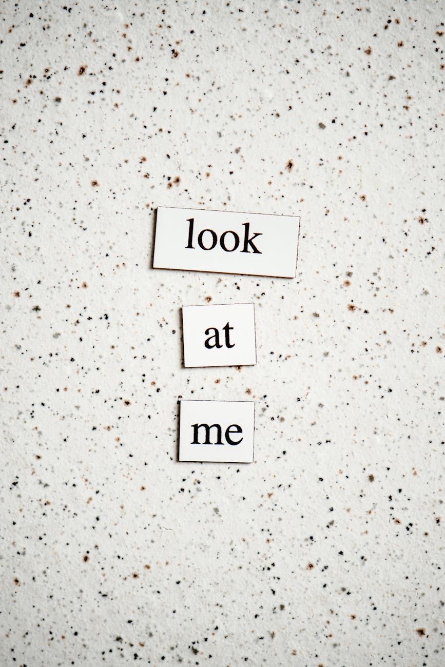 paper cutout of words on a flat granite surface